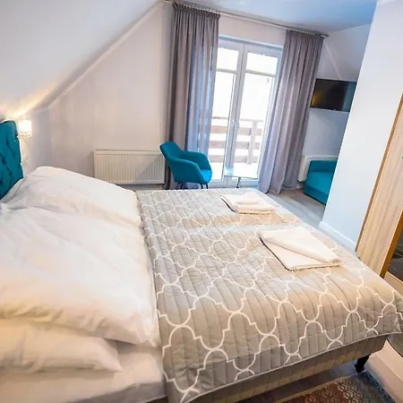 Nad Stawem 度假居 *